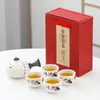 Actividades de apertura con pequeños regalos ambiente práctico acompañante de exposición regalo de empresa reunión anual traje de juego de té copo de nieve