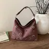 Bolso Vintage para Mujer 2026 Primavera Nueva Moda Versátil Bolso de Mano Calado Bolso de Hombro Bolso Perforado Mochila de Axila para Mujer