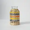 Funda tejida de caña transfronteriza para jarrón, Cubierta protectora de alta estética para decoración de mesa interior, Cubierta de vidrio tejida a mano al por mayor