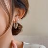 Pendientes coreanos de metal con diseño de nicho, con forma de espiral, dorados, irregulares, elegantes y ligeros, de lujo.