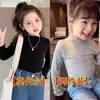 Camiseta de manga larga de color liso con encaje para niña, nueva y moderna, para primavera y otoño, fina, en liquidación, de algodón para otoño e invierno.