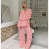 Nuevo conjunto de pijama de estilo transfronterizo, color blanco roto con estampado de corazones, suave, transpirable, agradable para la piel, textura de gasa, manga larga, pantalón largo