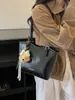 Bolso tote de alta gama de moda para mujer, nuevo bolso de hombro versátil de moda 2026, bolso grande simple y elegante