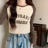 Principios de otoño único chic top raglán para mujer Americano retro color de contraste estampado camiseta de manga larga camisa corta para llevar debajo