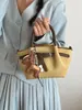 Bolsa Saco de Couro de Alta Qualidade com Padrão de Lichia 2026 Nova Coleção de Primavera Bolsa de Mão e Bolsa Transversal Design de Nicho Fashionável Bolsa Asa