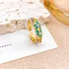 Anel Mais Vendido Estilo Chinês Anel de Flor Oca com Gotejamento de Óleo Nicho Alto Padrão Luxo Leve Temperamento Versátil Anel Não Desbota