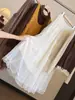 Falda de malla con ribete de encaje, nueva colección de otoño para mujer, de cintura alta, adelgazante, estilo coreano, elegante y deslumbrante falda larga de línea A con dobladillo acampanado.