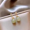 Pendientes pequeños sencillos de estilo chino retro, nuevos y modernos, con diseño de nicho Hanfu, accesorios únicos que combinan con todo.