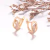 Pendientes Xuping de estilo retro con doble aro y forma de lágrima D, hechos de aleación de cobre, con un diseño hueco de moda y una estética única y de nicho, para mujer