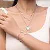 Amazon Moda Acero Inoxidable Incrustado Circonita Corazón Pulsera Collar Conjunto Popular Europeo y Americano Joyería Nueva Venta al por Mayor