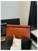 2026 Nuevo Colorido de Moda Bloques de Color Patrón Tejido Simple Casual Noche Viaje Diario Bolso de Mano tipo Clutch Envelope Casual para Mujer