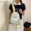 Mochila Transfronteriza Linda y Divertida Nuevo Estilo 2026 Bloques de Color Cuadros Frescos Bordado Gato de Dibujos Animados Mochila Multiusos
