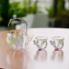 Juego de té de vidrio resistente al calor con calcomanía aplicada a mano, con una tetera y dos tazas, exquisita cesta con forma de pétalo, tetera individual