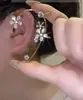 Brincos de Clipe para Orelha Flor de Zircônia de Luxo Leve Inspirados no Tiktok, Design de Nicho com Toque de Alto Padrão, Brincos sem Furo, Presilhas e Brincos Elegantes