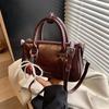 Bolso de mano de alta gama tipo almohada Boston para mujer, nuevo para Primavera y Verano 2026, bolso de hombro y bandolera retro versátil