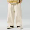 Valle del Viento 2026 Otoño Nuevo Estilo Coreano Gama Alta Pantalones Casuales de Algodón de Color Sólido para Niños Ajuste Holgado Pantalones de Pierna Curva para Niños