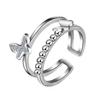 Jin Jiahua moda coreana no alérgica anillo de cola de doble mariposa anillo de cola oro rosa X anillo de mariposa pequeño suministro