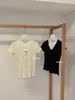 Wgwe8780 Ropa de Mujer Guangzhou Shisanxing Verano Nuevo Lunares Cuello en V Adorno de Encaje Manga Corta Camiseta Top Corto Moderno