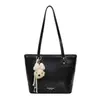 Elegante y texturizada nueva bolsa tote de gran capacidad para ir al trabajo, 2026 bolso de hombro casual con patrón tejido retro para mujer