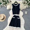 Chal sin mangas de retazos de encaje estilo francés ligeramente maduro Falda de cintura alta Conjunto de punto elegante de dos piezas para mujer Verano 2026