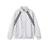 Marca Deportiva Americana de Moda Sudadera con Cremallera y Cuello Alto Cardigan Sudadera con Capucha Hombres Mujeres Otoño Invierno Pareja Holgada Rayas Patchwork Chaqueta de Moda