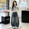 Jeans de Primavera y Otoño para Niñas 2026 Nuevo Casual Estilo Deportivo de Niña Pantalones de Pierna Ancha de Mezclilla Estilo Graffiti Ropa Suelta para Niños
