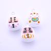 Estilo japonés y viento atraen bendición multicolor división Yin y Yang Dharma agua piano Campana DIY decoración de joyería campana de cobre completamente cerrada lingote