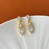 Pendientes geométricos explosivos de circonita con forma de gota de agua, ligeros, lujosos y con un diseño de nicho súper llamativo, a la moda, sencillos y combinables para damas.