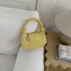 Bolsa de Mão com Padrão Trançado Fashion 2026 Novo Modelo de Alto Valor Estilosa Bolsa Meia-Lua Estilo Coreano Nicho Bolsa de Ombro Transversal