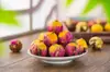 Té aromático de bola de dragón Pu'er hecho a mano de Yunnan transfronterizo té de bola de dragón de jazmín venta al por mayor té aromático de bola de dragón flor de rosa y peonía