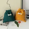 Bolsa de almacenamiento de pana de color sólido de gran capacidad, bolsa de cosméticos con cordón, bolso rojo portátil para mujer, monedero