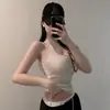 Ropa de mujer de comercio exterior, nuevo estilo coreano Dongdaemun, elegante y ajustada, cuello halter, sin espalda, favorecedora de la figura, top sin mangas versátil