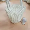 Bolsa de Cuentas Hecha a Mano Casual de Suministro Directo del Fabricante Personalizado Bolso de Moda Bolso de Perlas de Imitación Bandolera Elegante Bolso Tipo Cubo Bandolera