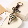 Chaveiro de Urso Cartoon de Liga Punk Criativa Pequeno Presente para Homens e Mulheres Pingente de Chave de Couro Trançado Vintage Lote