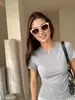 Camiseta de Gola Redonda com Manga Curta para Mulheres, Venda Quente no Comércio Transfronteiriço Europeu e Americano, Versátil para o Verão 2026, Top Base de Malha Curto Slim