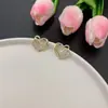 Pendientes Minimalistas de Corazón Hueco con Tachuelas de Diamante Super Brillantes Estilo Coreano Pendientes Dulces Elegantes Exquisitos de Nicho Pendientes de Moda Populares