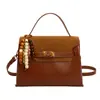 Bolsa de Ombro para Trabalho e Dia a Dia Design de Nicho 2025 Novo Modelo Bolsa de Mão Estilo Retrô de Alto Padrão Elegante Bolsa Transversal Feminina