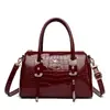2025 Nuevo Bolso Transfronterizo de Charol para Mujer Bolso Grande de Mujer Bolso Bandolera de Mano con Patrón de Cocodrilo Bolso Boston para Mamá