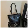 Bolso de mano de alta gama de gran capacidad, nuevo modelo 2026, simple, de hombro, para ir al trabajo, de moda, versátil, bolsa tote para estudiantes para mujer