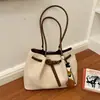 Bolsa de Mano Retro Transfronteriza Simple para el Trabajo Diseño de Nicho Textura Casual Elegante Lujo Ligero Bolso de Hombro Individual