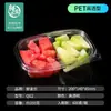 Caja rectangular de plástico transparente con tapa, compartimentada y sellada, para empaquetar ensalada de frutas.