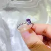 Anillo de moissanita morado con forma de huevo ovalado al por mayor estilo europeo y americano anillo de diamante bolígrafo de prueba cruzada caliente nuevo transfronterizo
