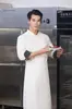 Uniforme de chef de alta qualidade para catering, de abotoamento duplo, com punhos em blocos de cor, adequado para cozinhas de hotel e operações de panificação, casaco de chef de manga longa