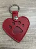 Nuevo en stock bolsa para pelo de mascota, linda funda protectora para pelo con forma de pata de gato, bolsa conmemorativa para uñas de gato y perro en forma de corazón