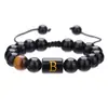 Pulseira Preta Personalizada com Contas para Homens Personalizável com a Inicial E em Contas Pretas Foscas e Detalhe de Pedra Olho de Tigre Nó Deslizante Ajustável Presente Estiloso e Único para Ocasiões Especiais