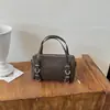 Bolso de Mano de Cuero Suave Retro de Nicho Almohada de Mano para Mujer Otoño Simple Versátil Lujo Ligero Viaje Diario Bolso de Hombro Cruzado