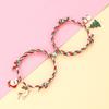 Pulsera navideña nueva de Amazon un par de Papá Noel de aceite goteando amor aleación succión magnética pulsera de pareja