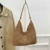 Bolsa tejida popular de celebridad de internet de gran capacidad para mujer 2026 Verano Nuevo Bolso de hombro único de paja Informal Bolso de playa para el mar
