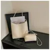 Venta al por mayor de bolsos tote nuevos de estilo coreano, sencillos y retro, con diseño para padres e hijos, gran capacidad y adecuados para uso casual, para ir al trabajo y como bolso de hombro o de axila para mujeres