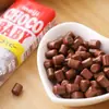 Importados de Japón Meiji Baby Mini Frijoles de Chocolate con Leche Mini Paquete Pequeño Caja de Snacks para Niños